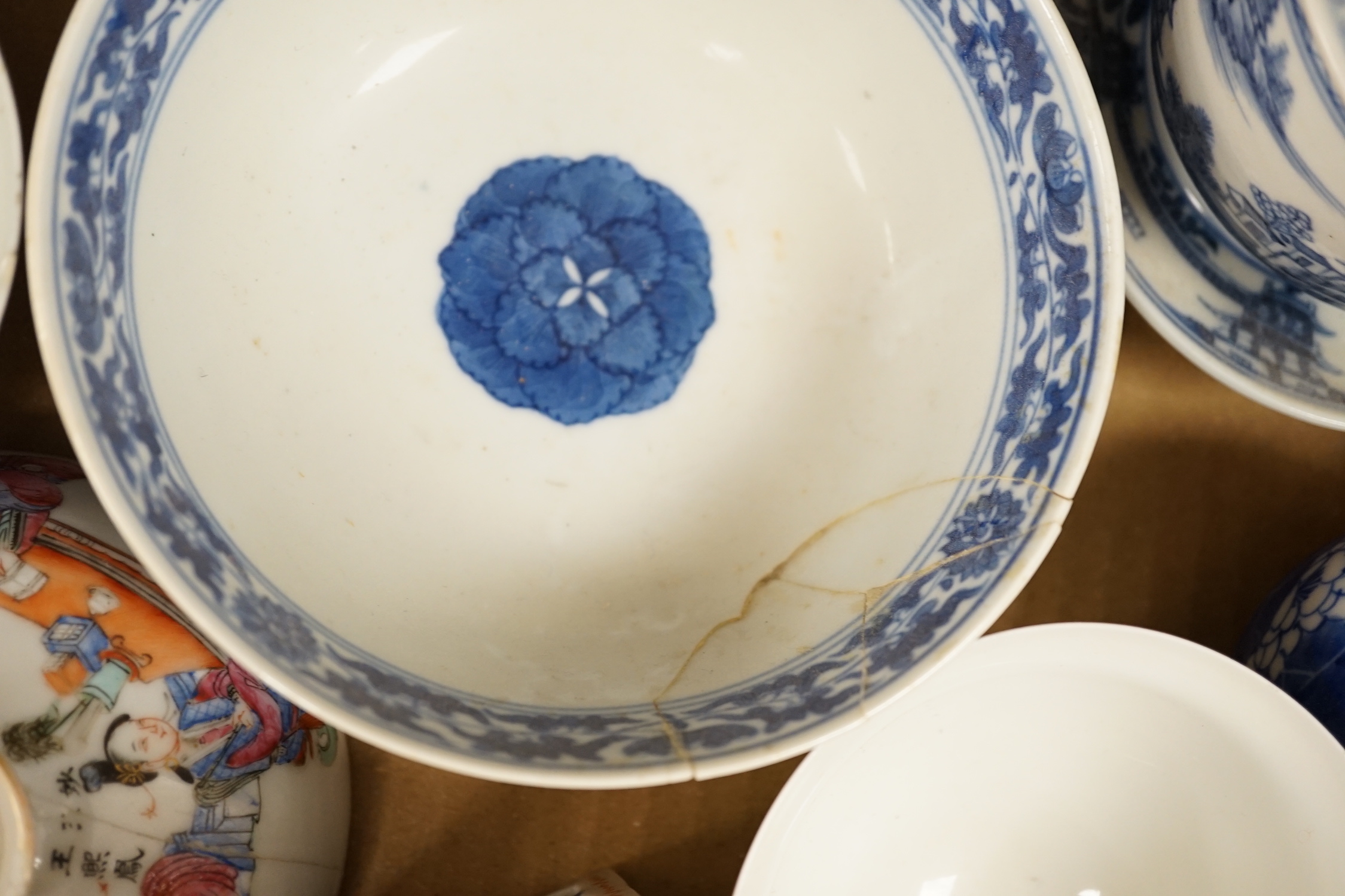 A collection of mostly Chinese blue and white bowls, plates, cups etc. 18th to early 20th century